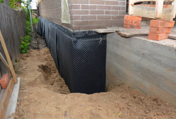 Happy homeowners after waterproofing job in Hobart